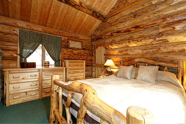 istock Cozy bedroom in log cabin house 477858699