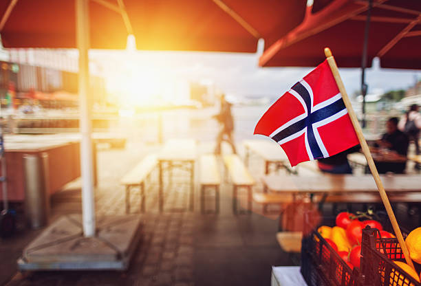 Norwegian flag at the harbor in Bergen, Norway.