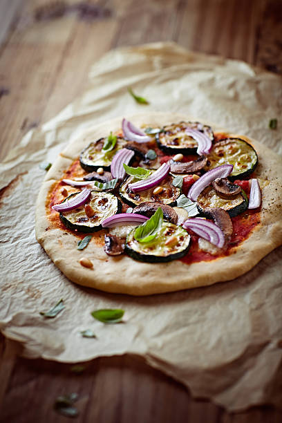istock Pizza with grilled zucchini, mushrooms and pine nuts 477858817