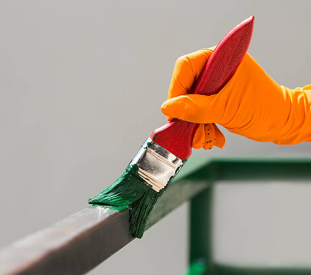 istock Painting with a paint brush 477863356