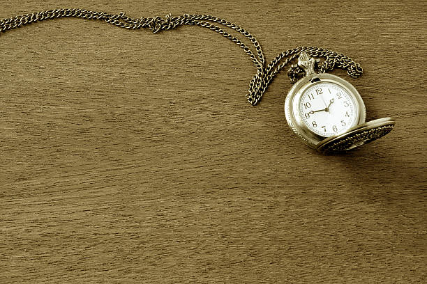 istock Vintage pocket watch on wooden. 477863830
