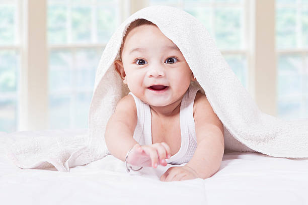 istock Joyful baby boy in the bedroom 477863998