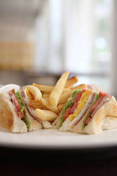istock Club sandwich with on wood background 477865807