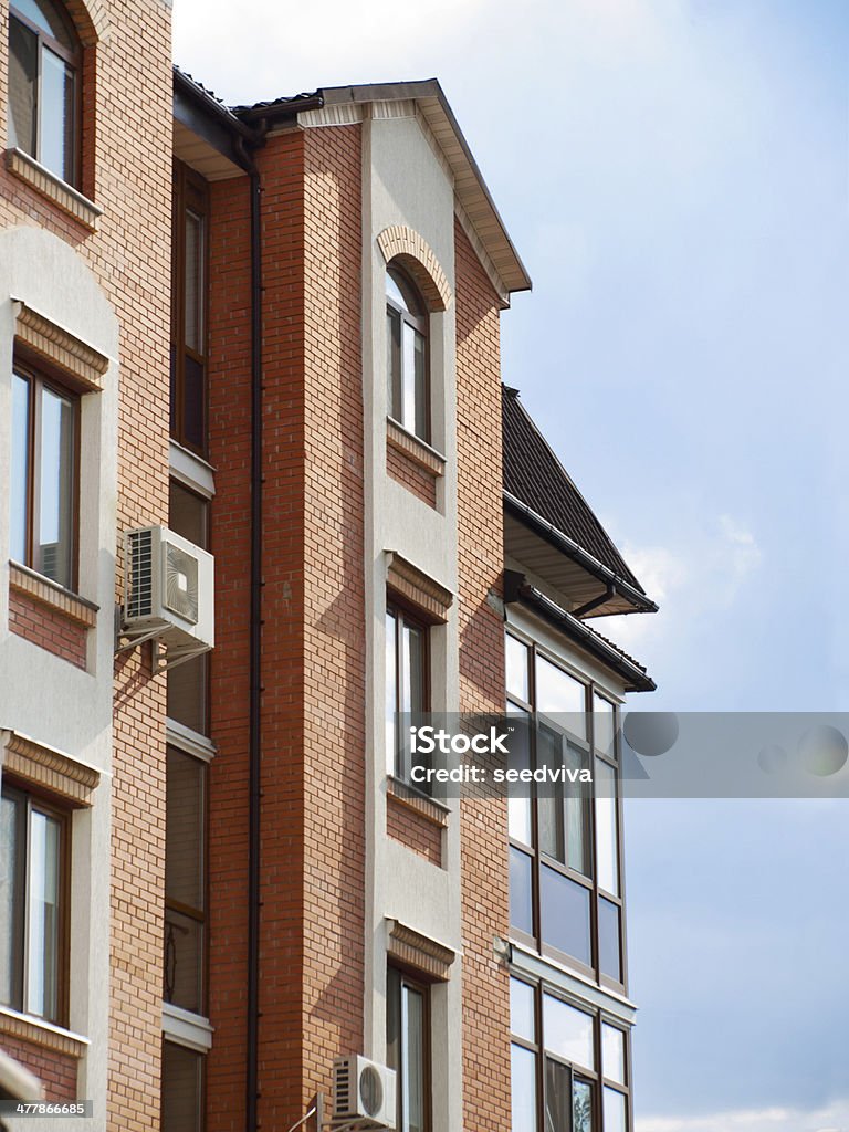 Residential house, urban style Residential house of brick, urban style Air Conditioner Stock Photo