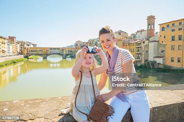 Mother And Baby Girl Taking Photo In Florence Stock Photo - Download Image Now - Florence - Italy, Family, Child