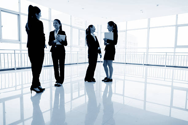 istock Group of Businesspeople discussing 477868426