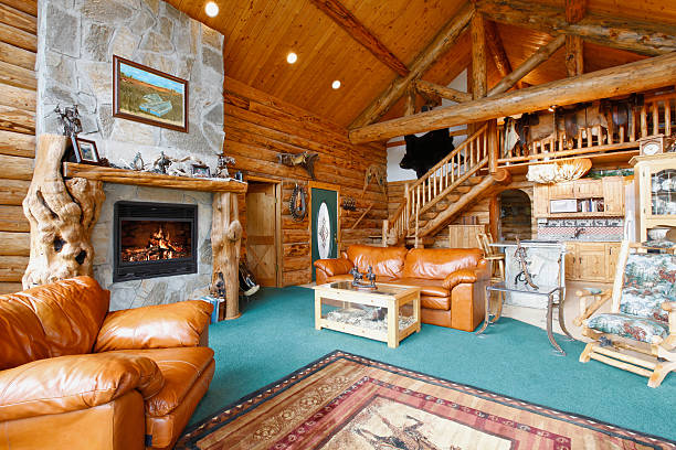 istock Log cabin living room 477868595
