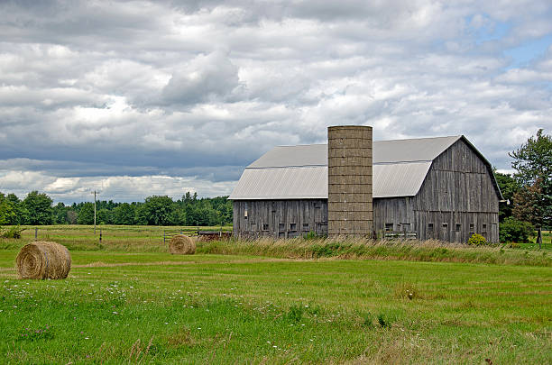 istock old country barn with hay bales 477869319