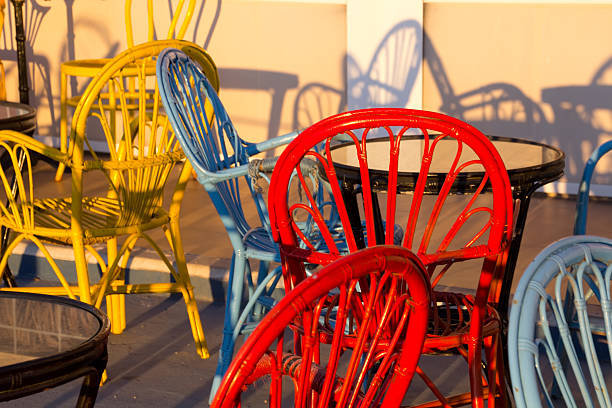 istock wicker and wood chairs with bright colors 477869657