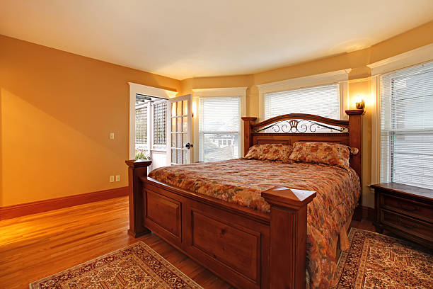 istock Large gold bedroom with red bed 477870371