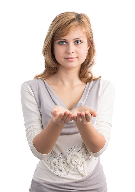 istock beautiful girl advertises holding something 477871707