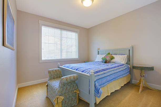 istock Simple cute quest bedroom with blue bed 477871863