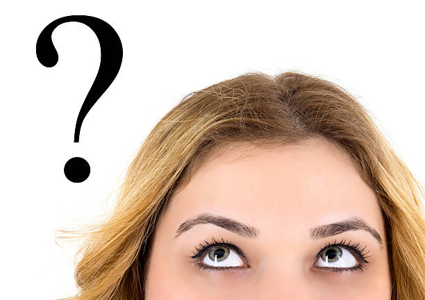 istock young woman looking up 477872737
