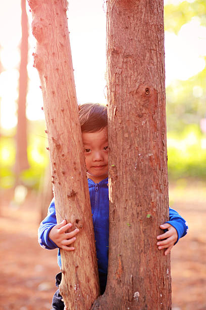 istock Cute Asian child in the park 477873177