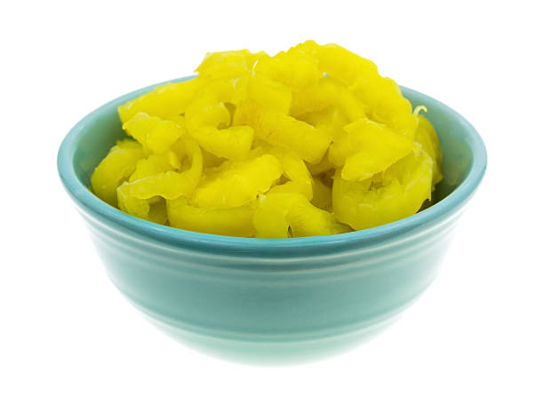 istock Banana peppers in a bowl on a white background 477873440