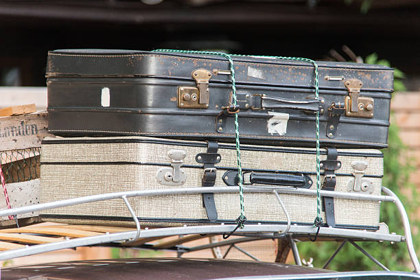 istock luggage on top of car 477873449
