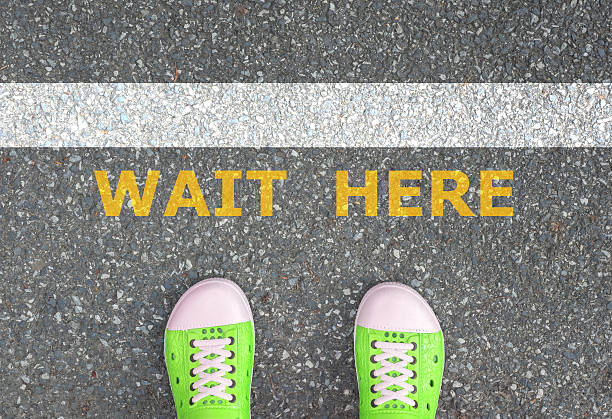 istock Shoes standing at the waiting line 477876596