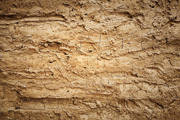 Texture of soil wall of traditional house stock photo