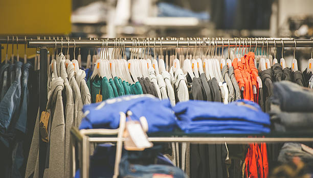 istock hangers with men's clothes in shop 477877244