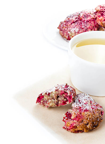 istock Raspberry cookie with oatmeal and cup of green tea 477879295