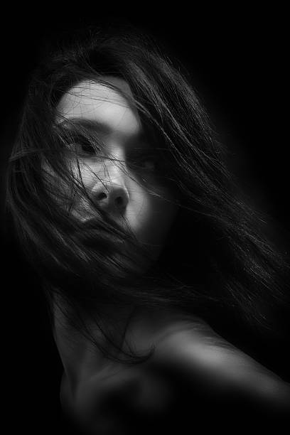istock woman with fluffy hair 477880050