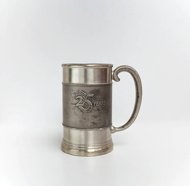 istock Old silver beer mug on white background center 477880064