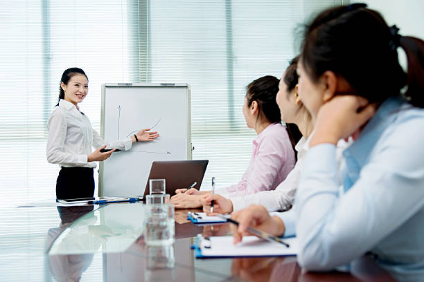 istock Businesswoman giving a presentation 477881034