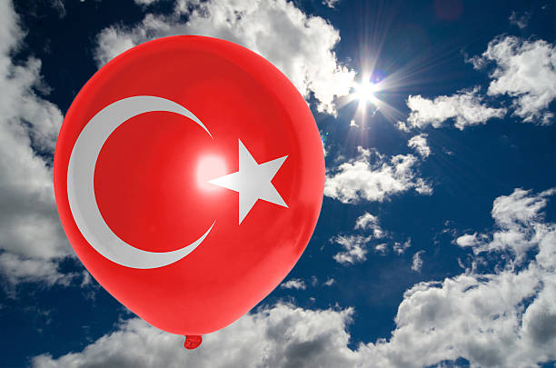 istock balloon with flag of turkey on sky 477883866