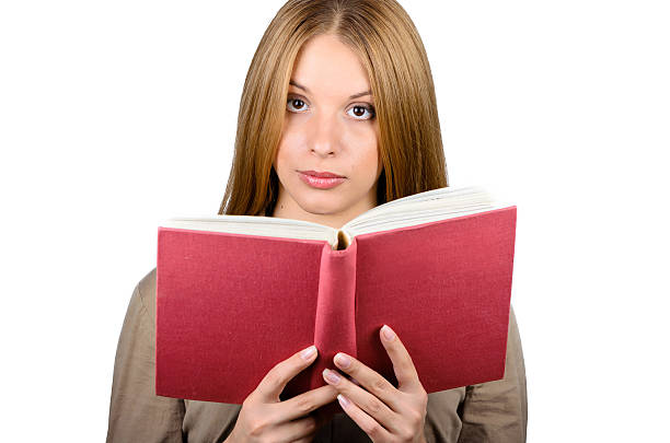 istock Beautiful woman with a book 477883897