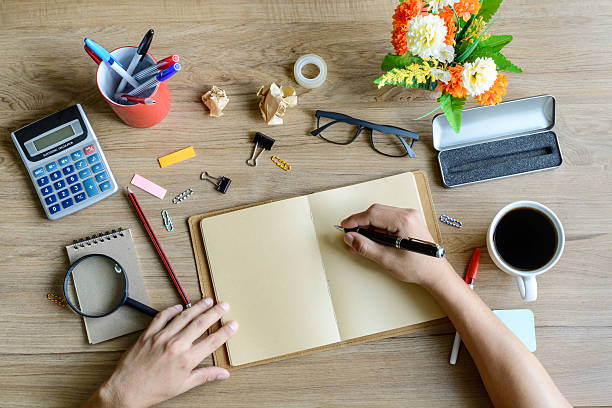istock office supply and Cup of coffee on desk 477885046