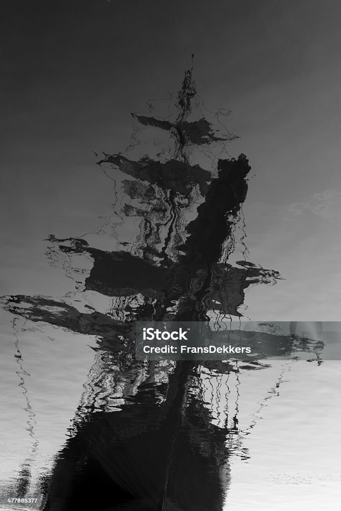 Ghostship Black and white photo of the reflection of a tallship, creating a ghostship. Extra contrast added Pirate - Criminal Stock Photo