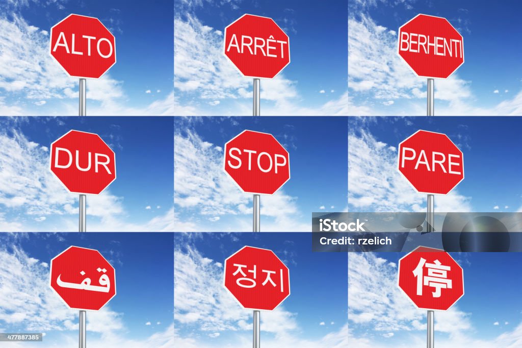Multilingual Stop Signs Multilingual Stop Signs On Sky Stock Photo - Download Image Now ...