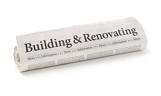 istock Rolled newspaper with the headline Building and Renovating 477888812