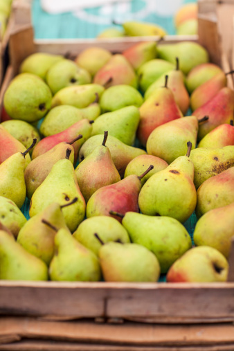 Crate of pears on the market.