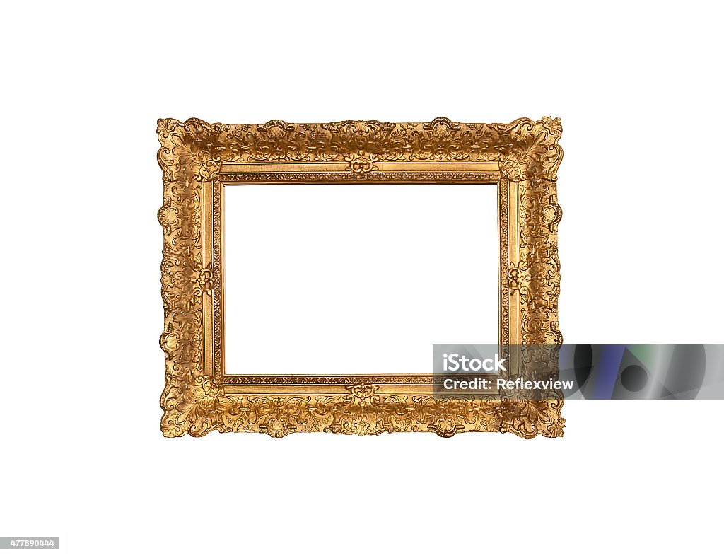 Old wood plaster and gold leaf frame An old frame 19th century wood base plaster carvings and gold leaf on white background 2015 Stock Photo