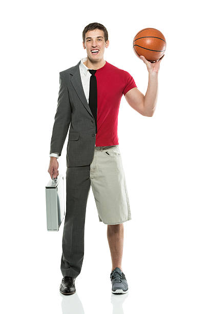 istock Split personality man with briefcase and basketball 477892887