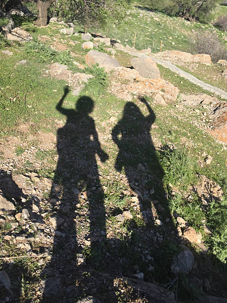 istock shadows of people 477893038