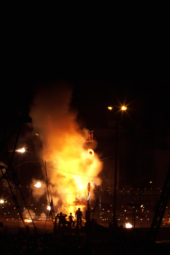 A large fire being lit to burn the effigies of Ravana, the evil on the occasion of Dussera in India.