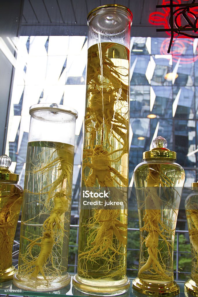 Preserved ginseng in jars Asia Stock Photo