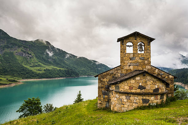istock France. Lac de Roselend. The chapel 477894598