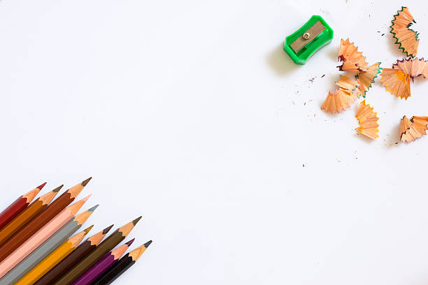 istock multicolored pencils growing row ,color sharpener and pencil shaves 477894682