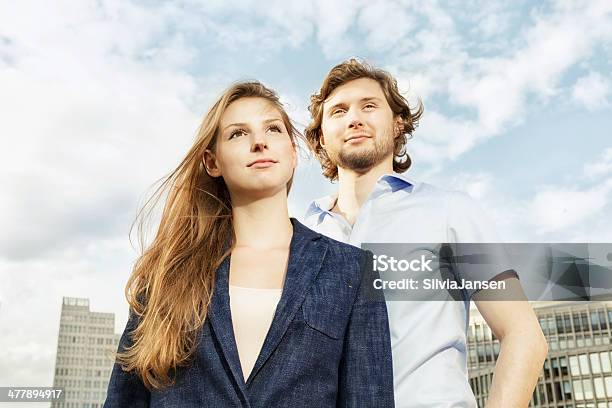 Cheerful Urban Couple Stock Photo - Download Image Now - 18-19 Years, 20-24 Years, 20-29 Years