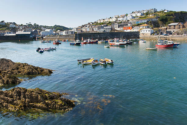 istock Rowing boats Mevagissey harbour Cornwall 477895187