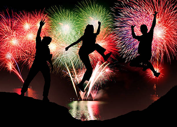 istock fireworks with happy people 477895759