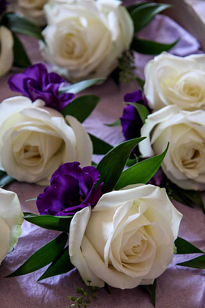 istock White Rose Wedding Buttonhole Flowers 477895789