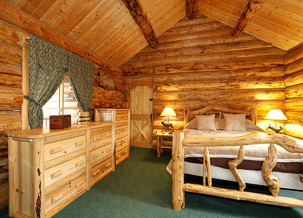 istock Cozy bedroom in log cabin house 477896315