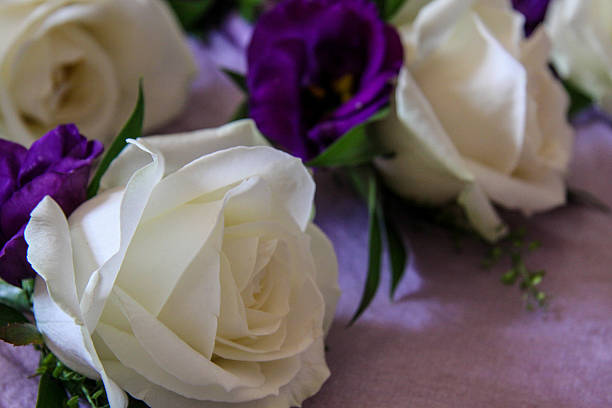 istock White Rose Wedding Buttonhole Flowers 477896999