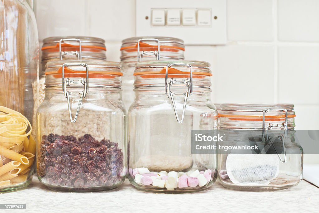 Food jars Jars with various food items in a home kitchen Canister Stock Photo