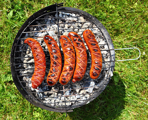 istock Grilling Sausages on barbecue grill 477897961