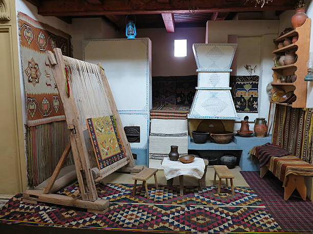 istock Ancient wooden vintage loom producing carpet 477898177